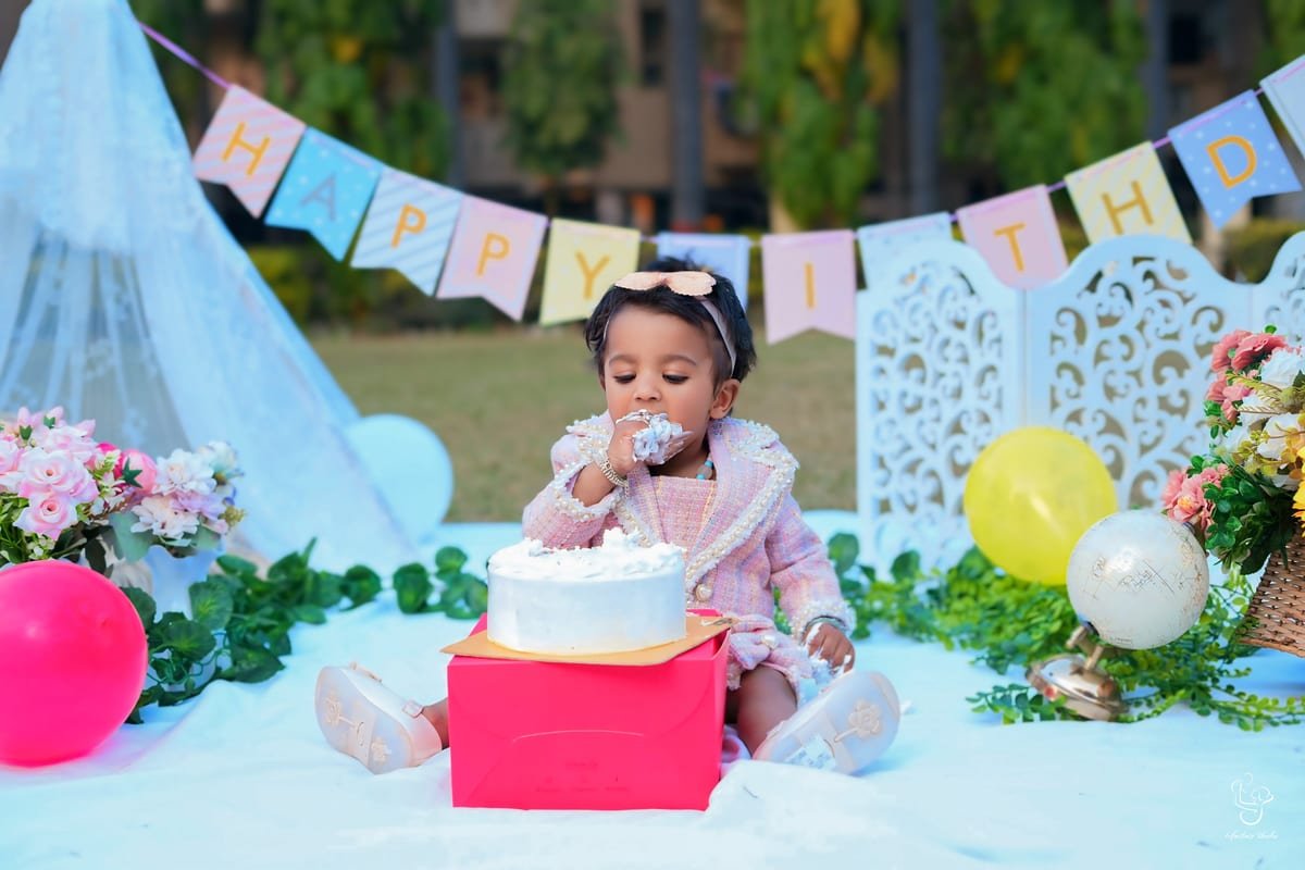 Baby with birthday cake smash