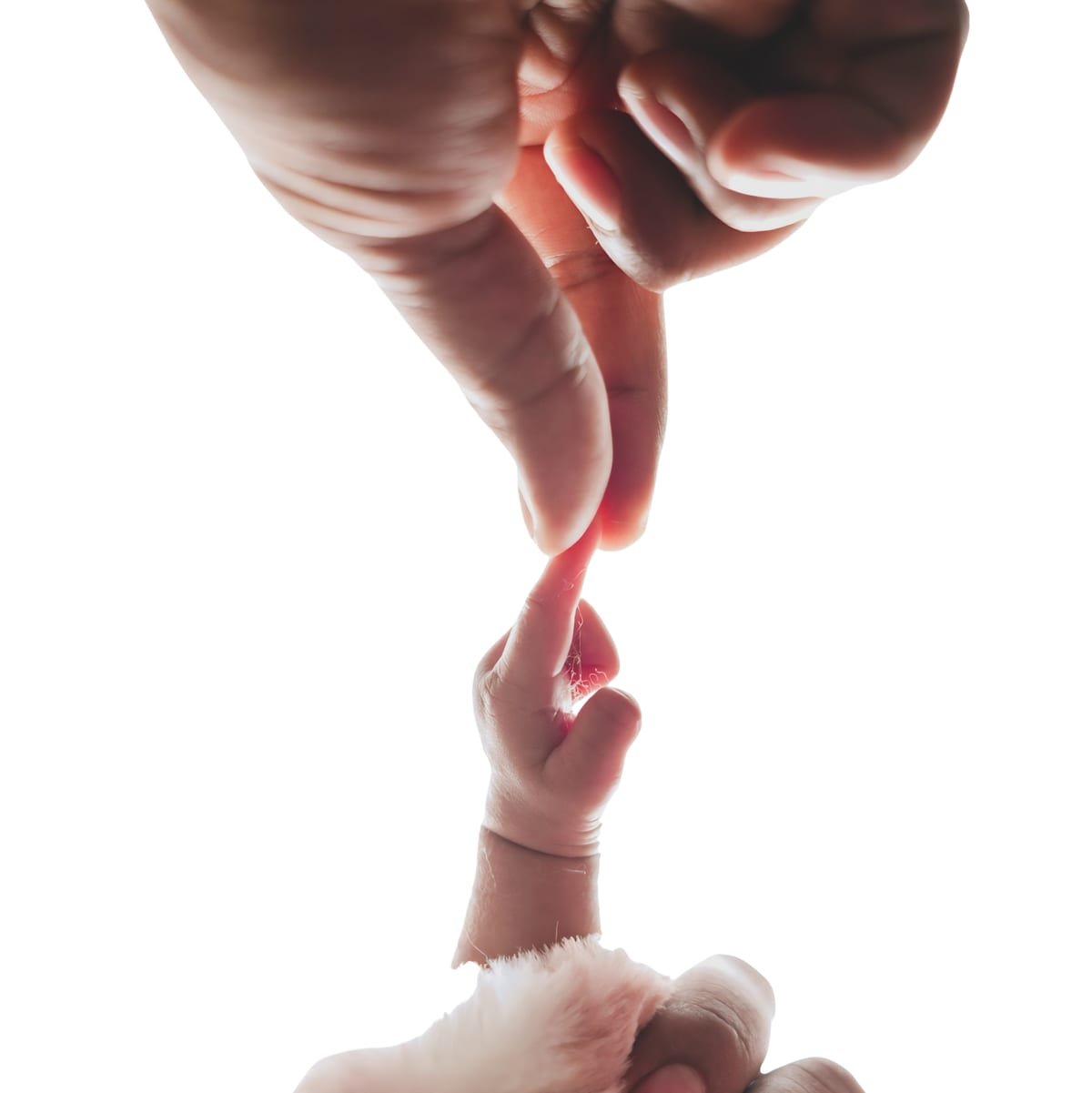 Baby feet cradled in mother hands