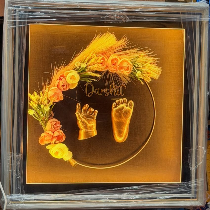 Gold newborn hand and foot cast with floral wreath frame — Darshit