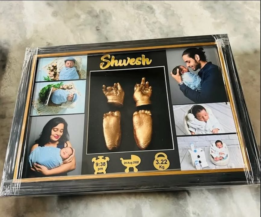 Family photo collage with baby hand and foot cast centerpiece — Shvesh