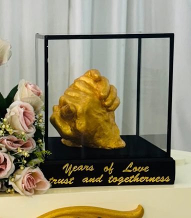 Couple hand cast keepsake — "Years of love, trust and togetherness"